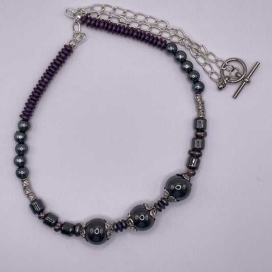 Hematite with a touch purple.